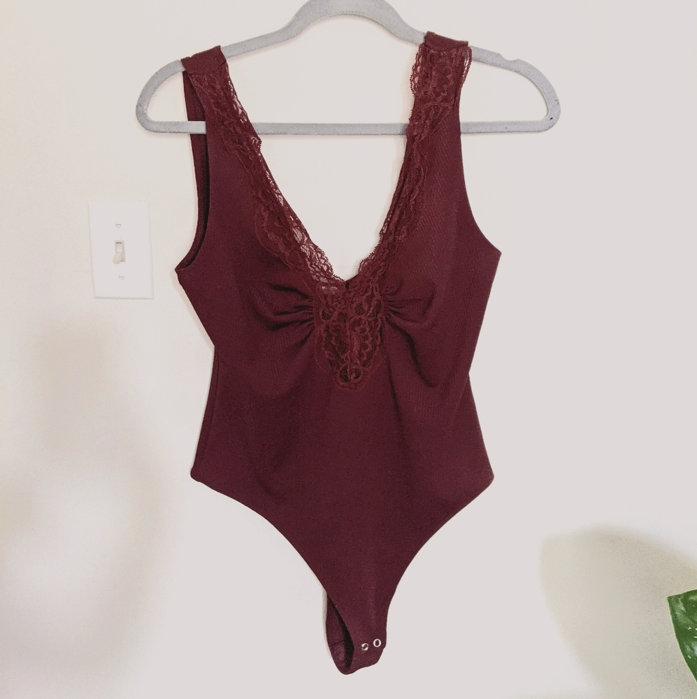 Free people red body suit (M). Lacy front